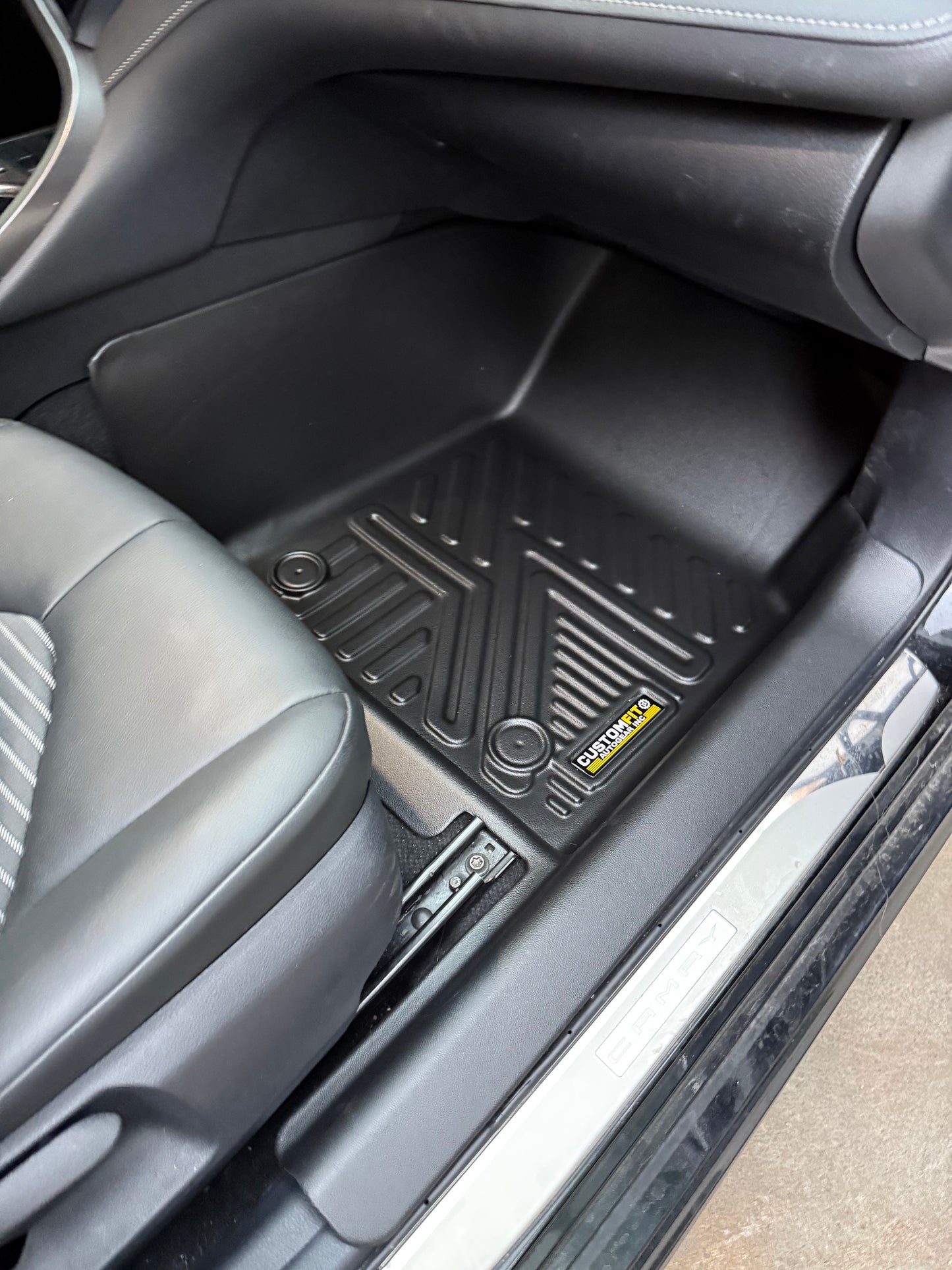 2018-2024 Toyota Camry Hybrid Passenger Seat Car interior with 5D black floor mats installed.