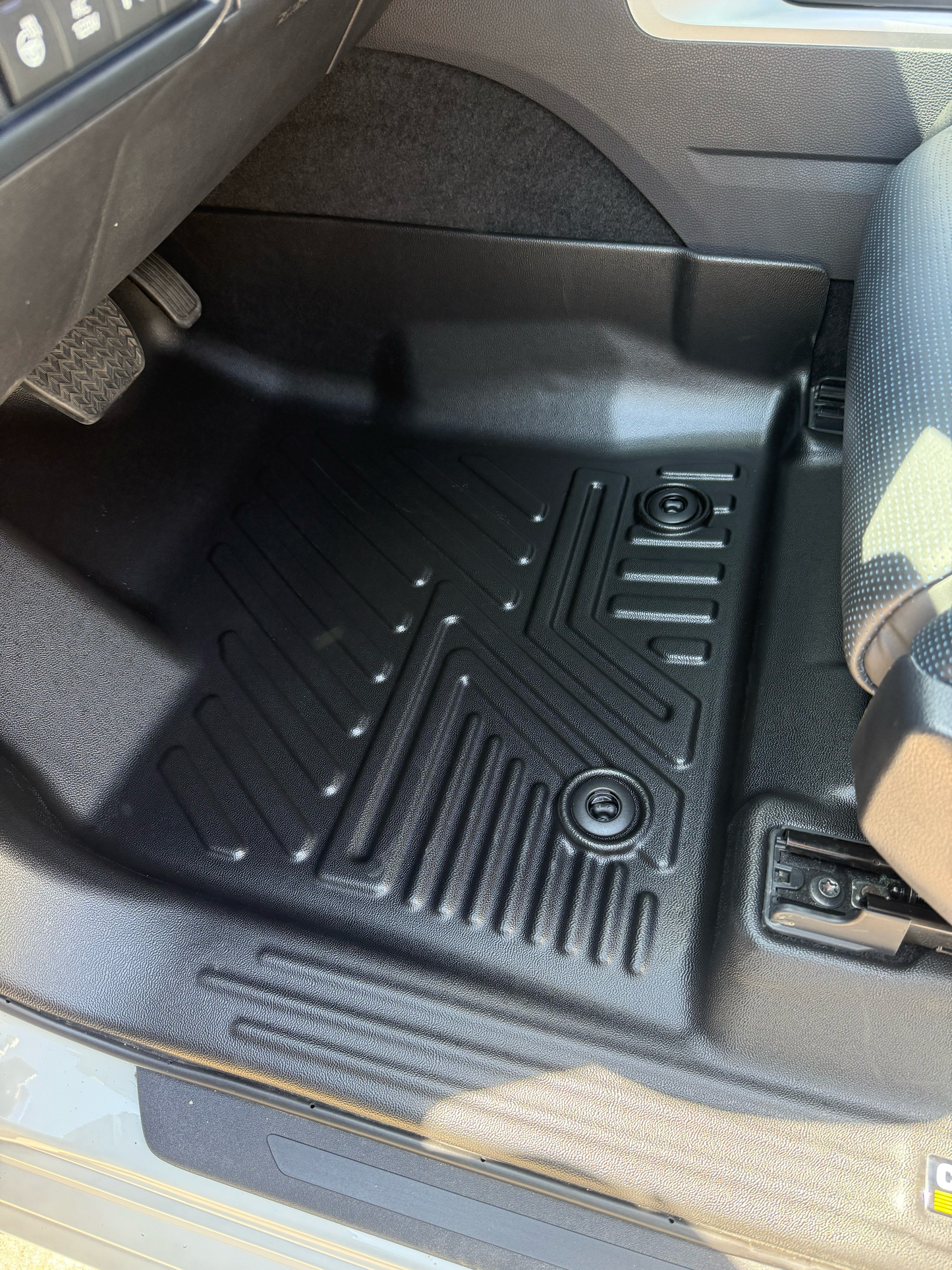 Toyota Tundra Crew Max black car floor mats in a vehicle interior