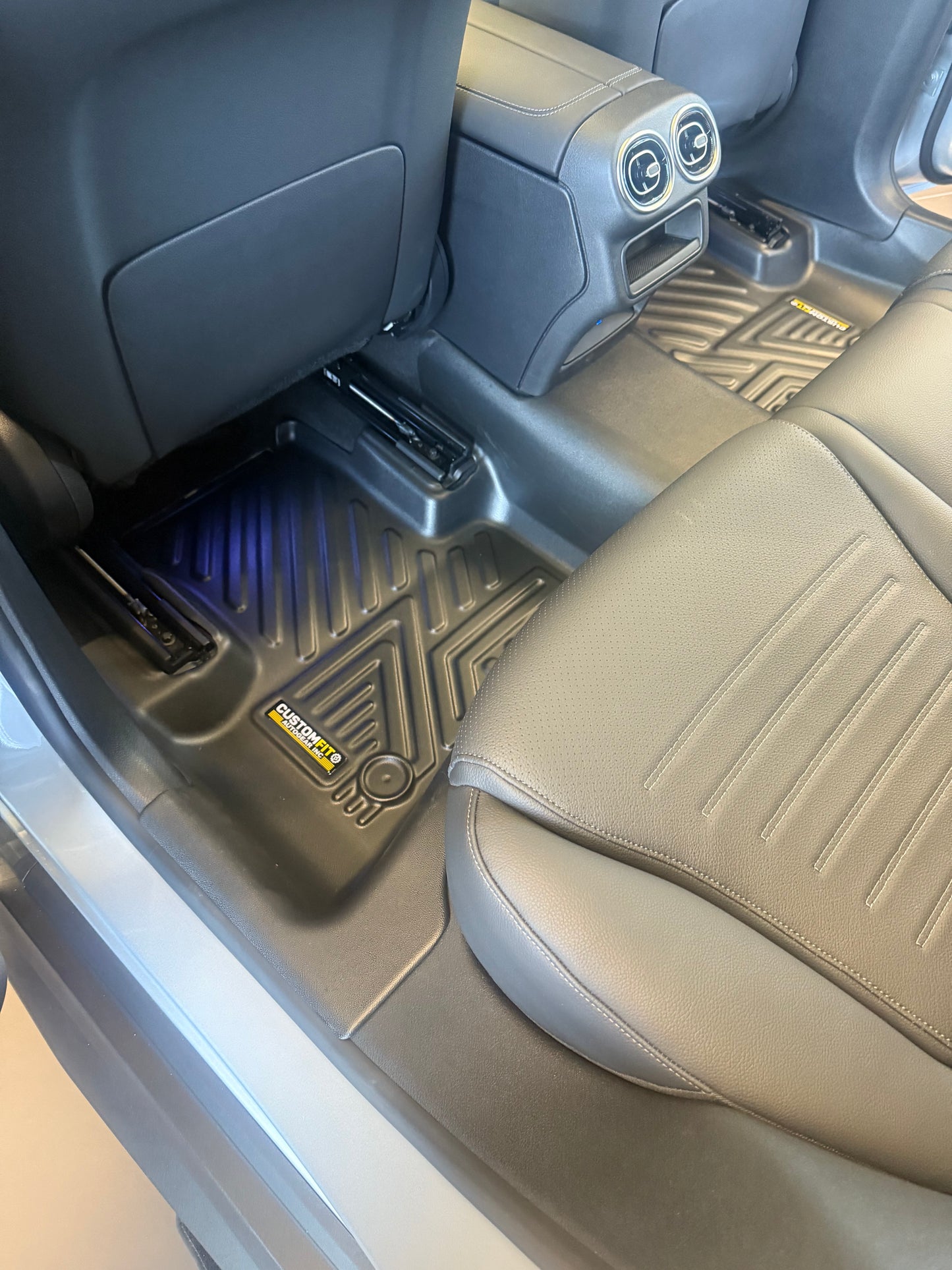 Mercedes Benz GLC 300 Car interior with a focus on the floor mat and seat.