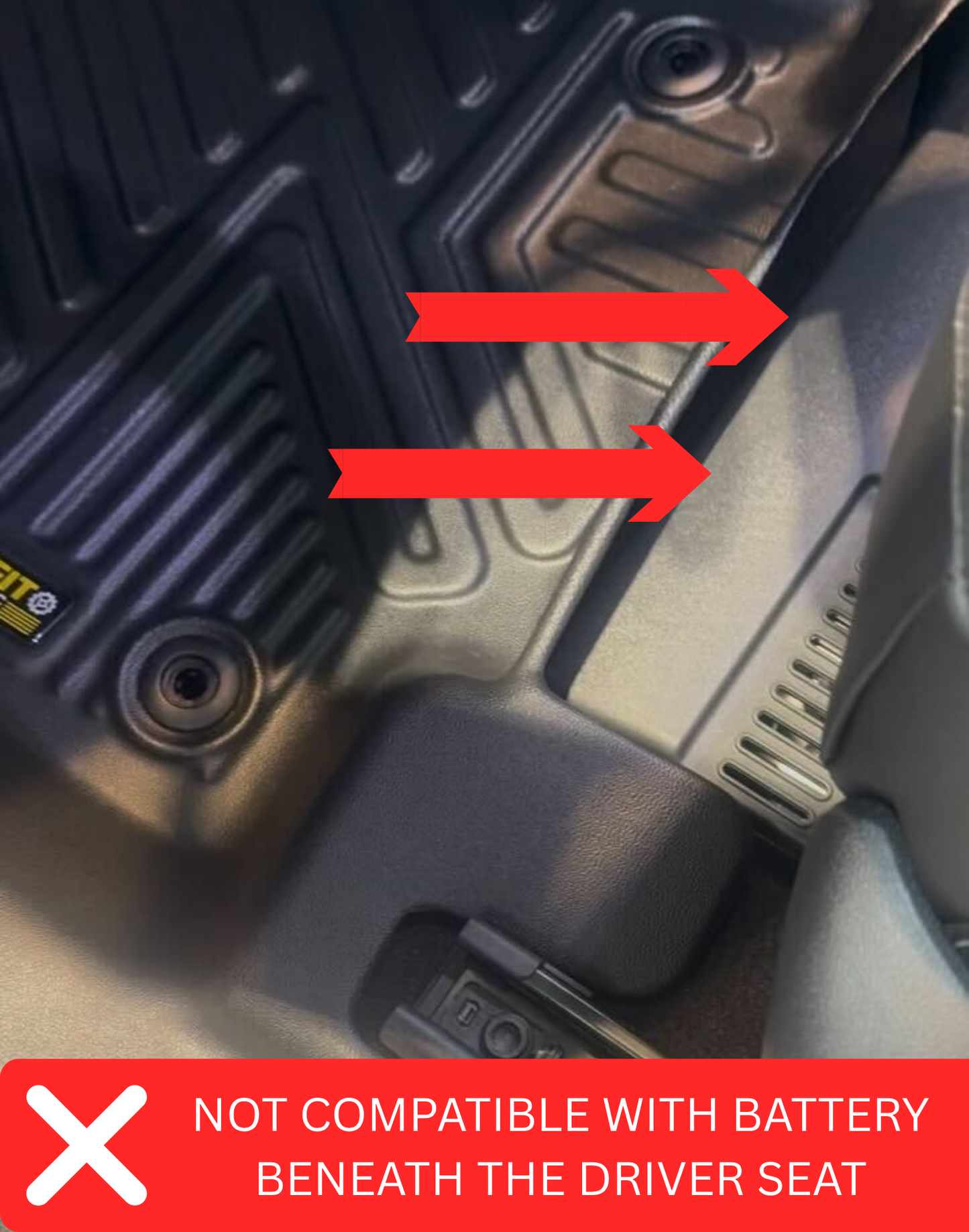 Car floor mat with red arrows pointing to a battery location and a warning label.